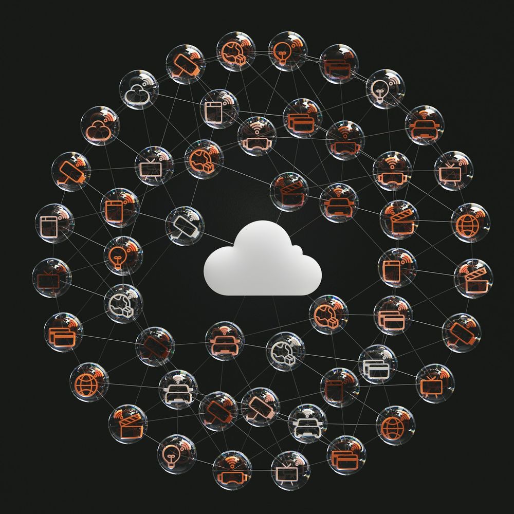 Illustration of a cloud connected by cables to a laptop and monitor